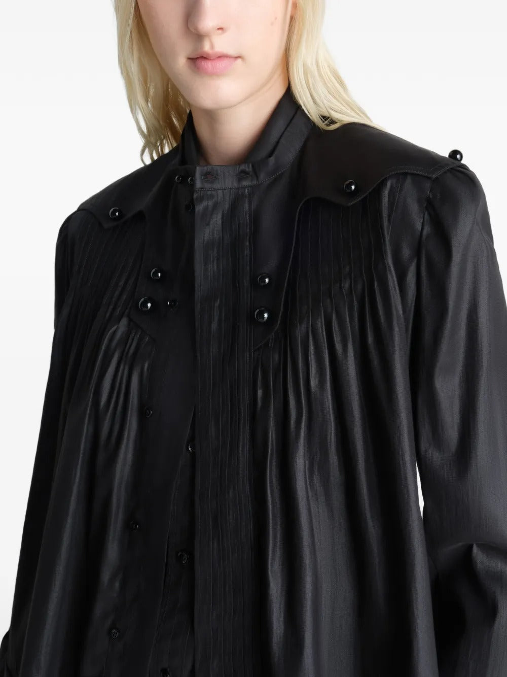Close up of black tops, showing texture of the triacetate and cotton and polyester fabric