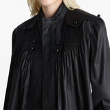 Close up of black tops, showing texture of the triacetate and cotton and polyester fabric