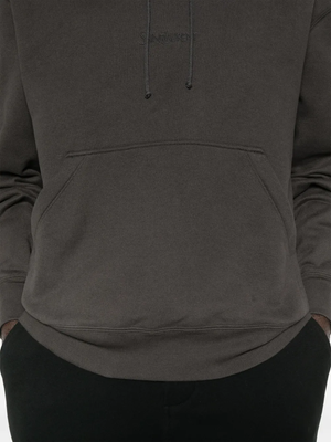 Close up of the grey hoodie, showing texture of the cotton fabric