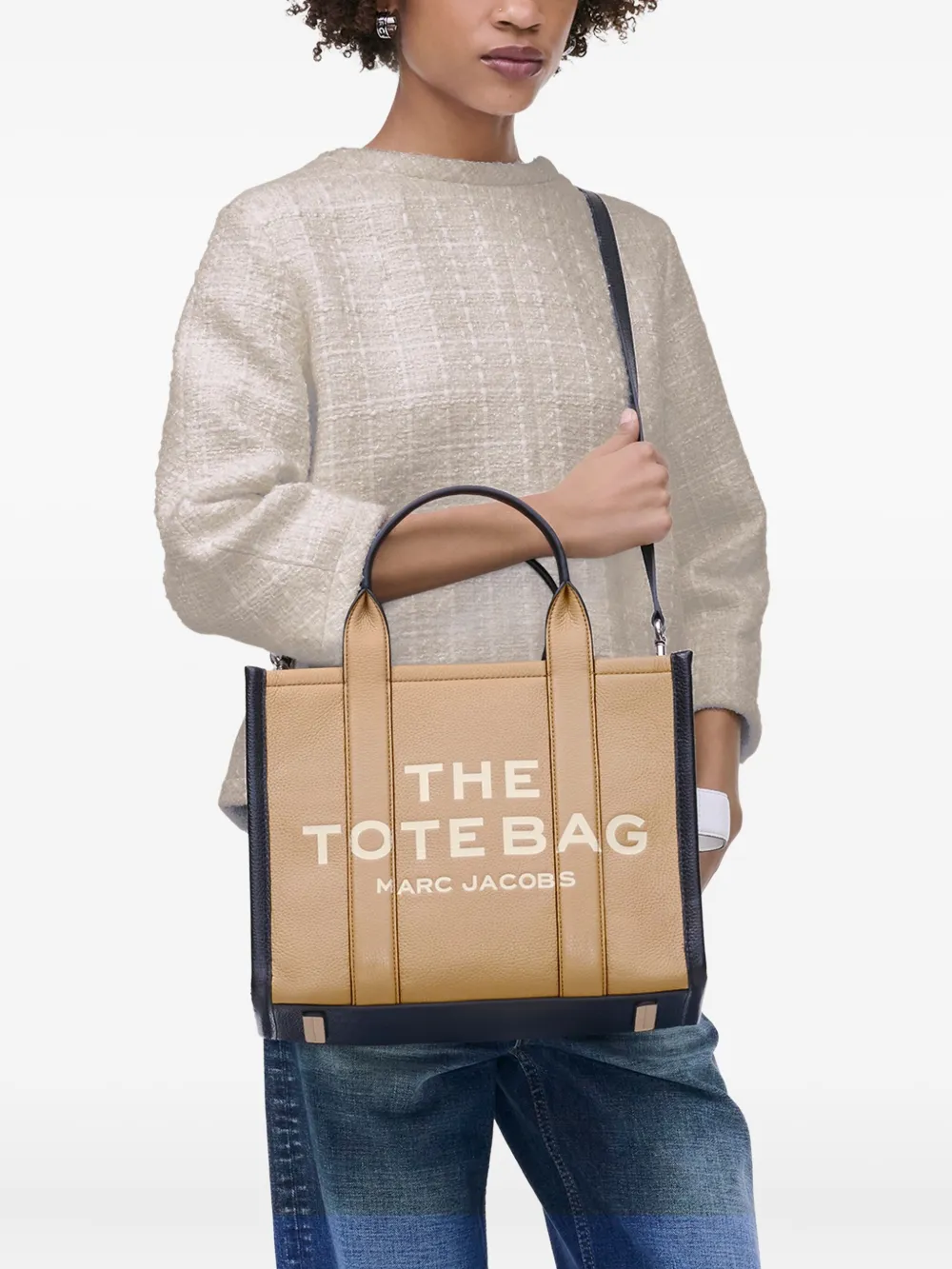 Brown bag worn by a person, showing the bag's fit