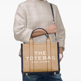 Brown bag worn by a person, showing the bag's fit