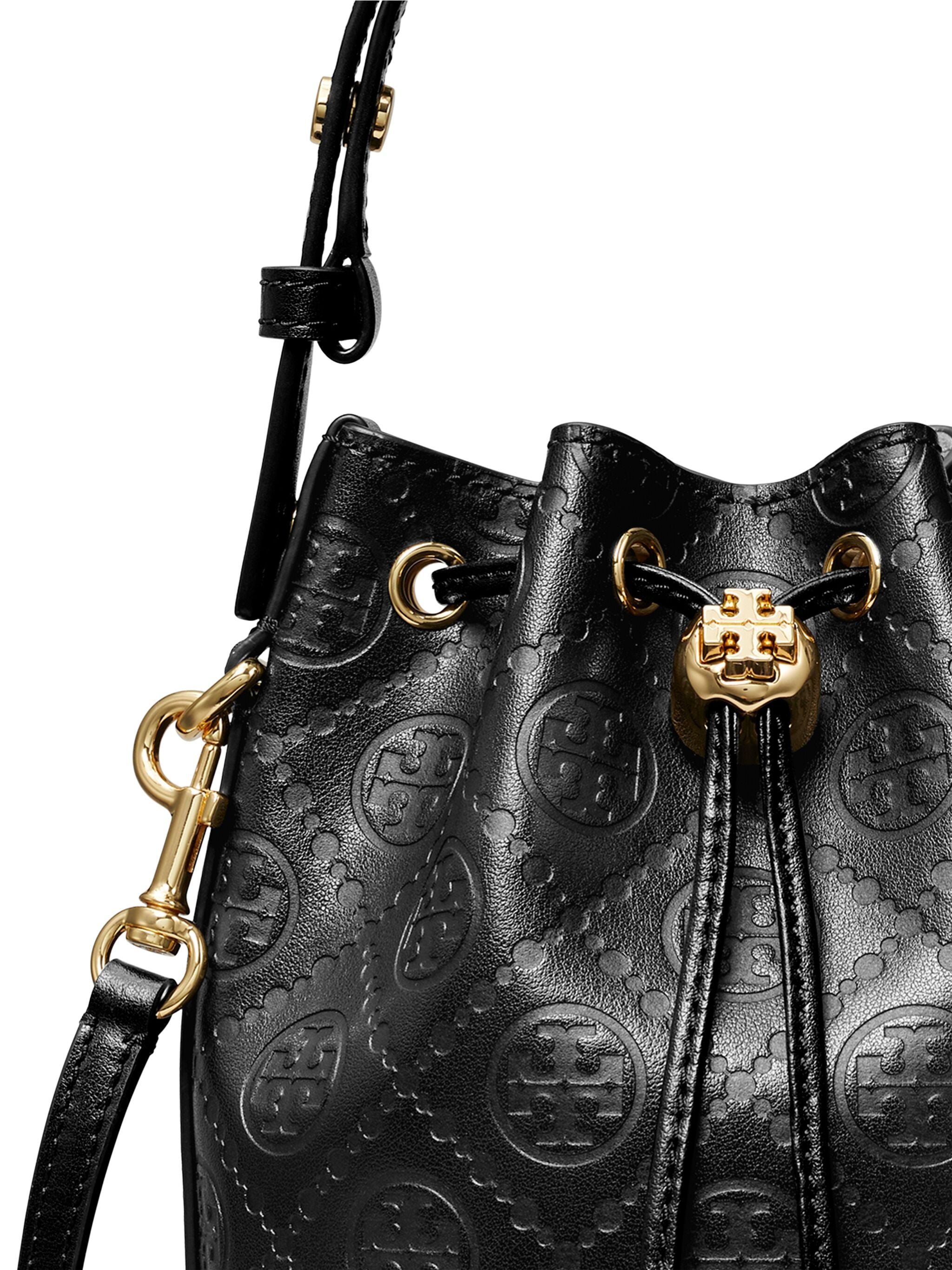 Close up of black bag, showing texture of the leather fabric