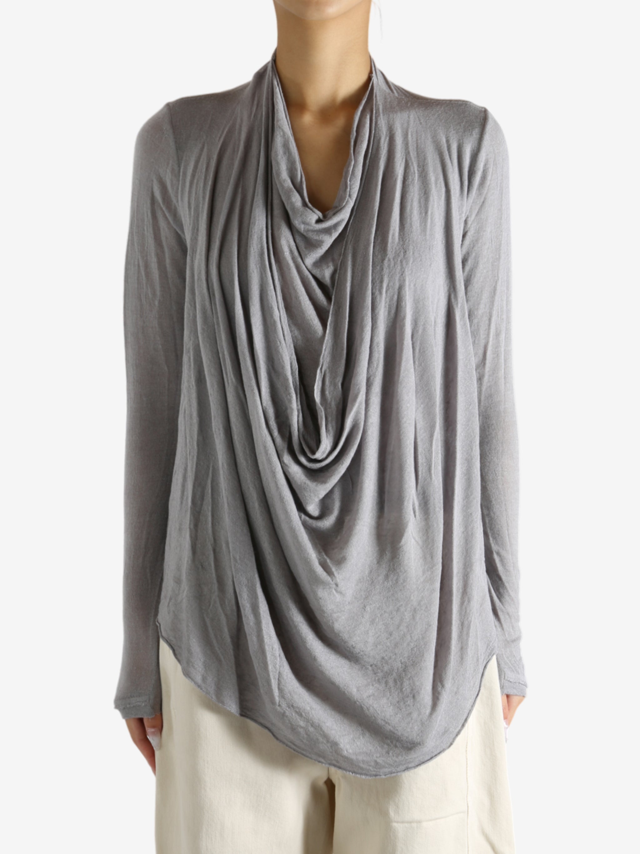Grey top worn by a person, showing the top's fit