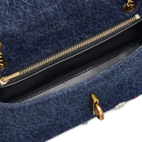 Close up of blue bags, showing texture of the polyester and cotton fabric