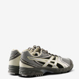 Grey sneakers, back view