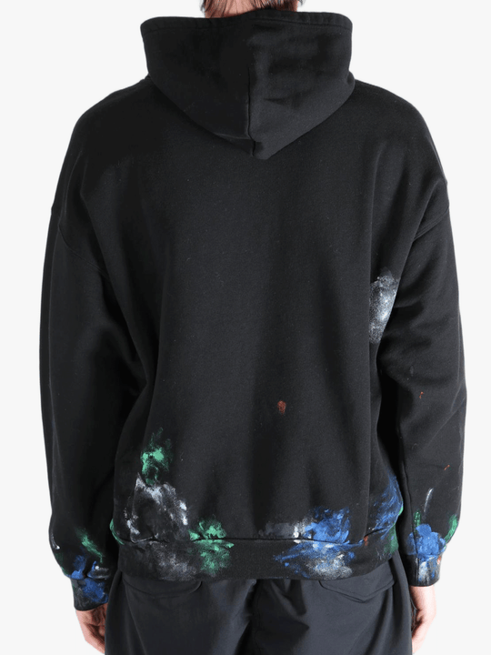 Black hoodie worn by a person, showing the  hoodies fit
