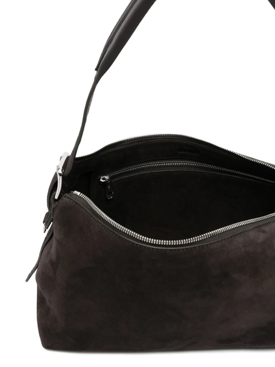 Close up of brown bag, showing texture of the calf suede fabric