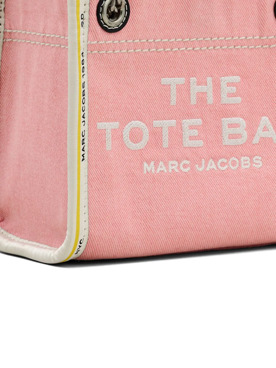 Close up of pink bags, showing texture of the cotton fabric