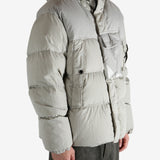 Grey jacket worn by a person, showing the jacket's fit