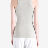 Tan top worn by a person, showing the top fit