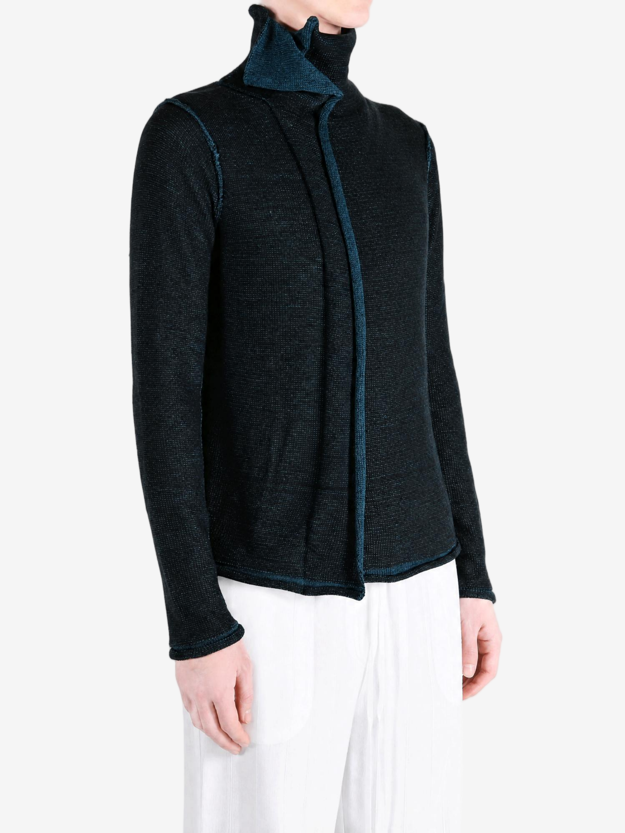 Black top worn by a person, showing the top fit
