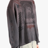 Grey top worn by a person, showing the top's fit