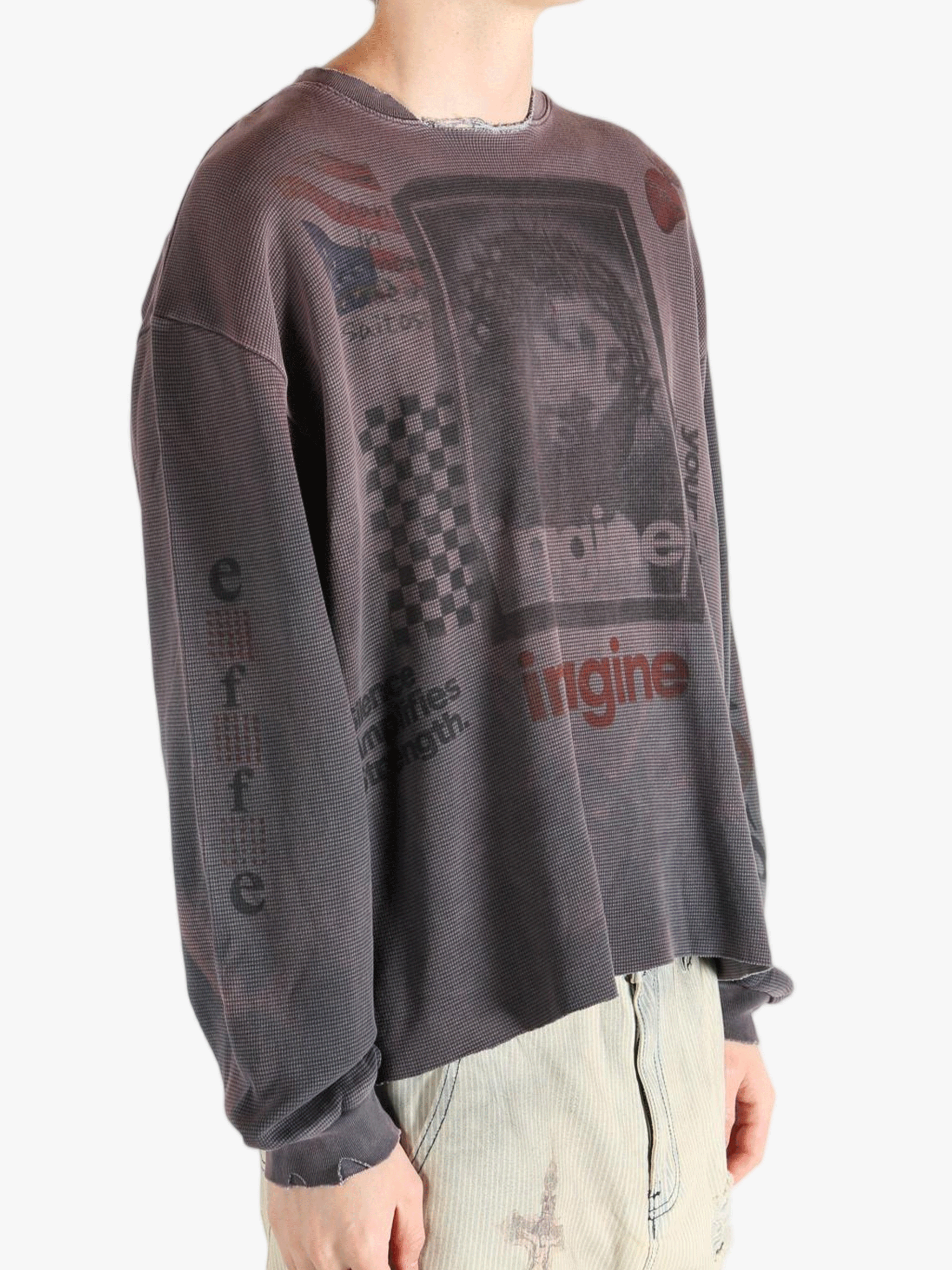 Grey top worn by a person, showing the top's fit