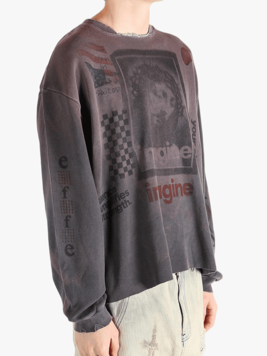 Grey top worn by a person, showing the top's fit