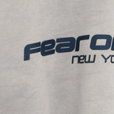 Close up of grey hoodie, showing texture of the Cotton fabric