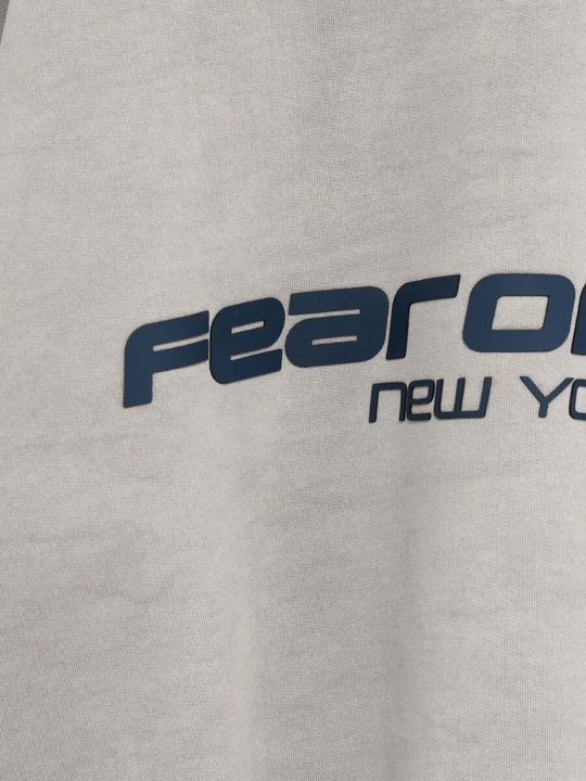 Close up of grey hoodie, showing texture of the Cotton fabric