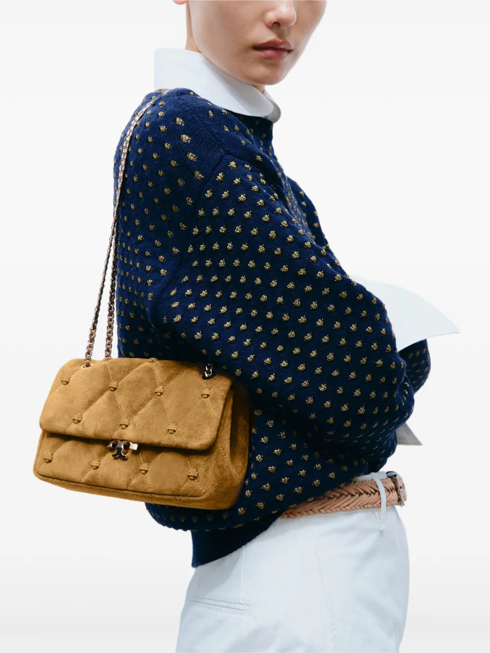 Tan bag worn by a person, showing the bag fit