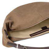 Close up of brown bag, showing the detail of the inner pocket