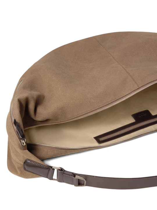 Close up of brown bag, showing the detail of the inner pocket