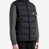 Black jacket worn by a person, showing the jacket fit