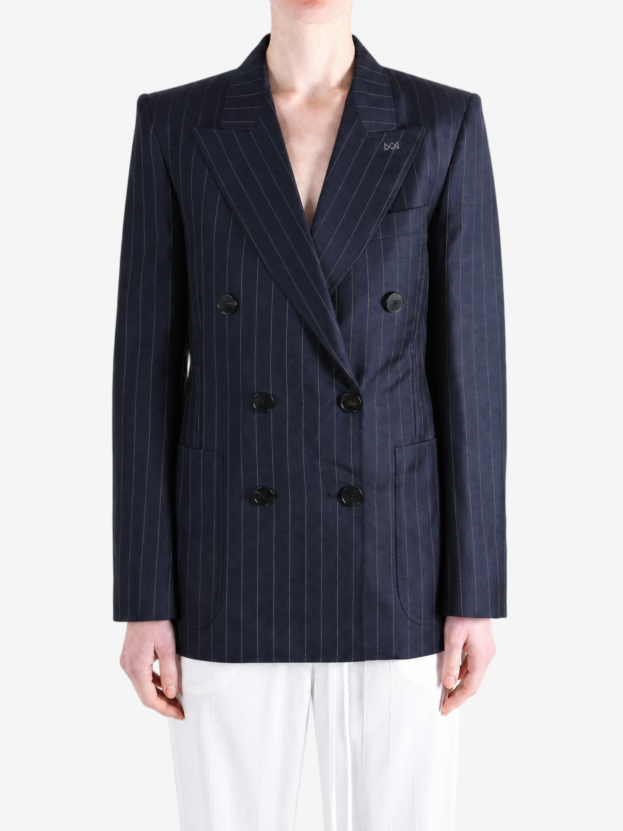 Navy jacket worn by a person, showing the jacket fit