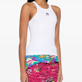 White top worn by a person, showing the top's fit