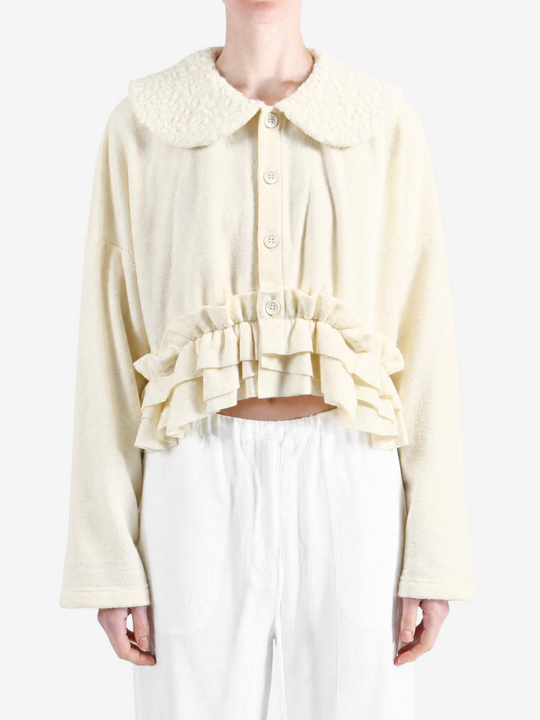 Tan knitwear, front view