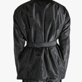 Black jacket worn by a person, showing the jacket's fit