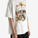 White t-shirt worn by a person, showing the t-shirt's fit