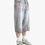 Blue shorts worn by a person, showing the shorts fit