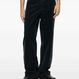 Green pants, full body view