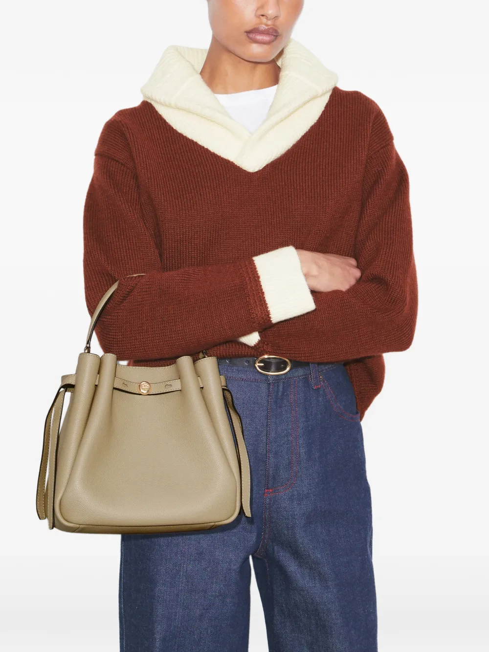 Brown bag worn by a person, showing the bag's fit