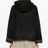 Black jacket worn by a person, showing the jacket fit