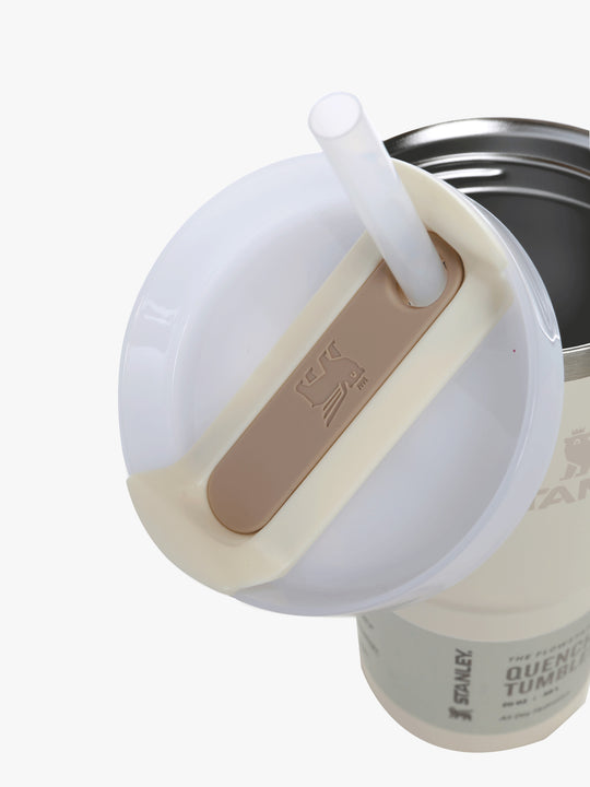 Close up of tan tumbler, showing texture of the stainless steel fabrica