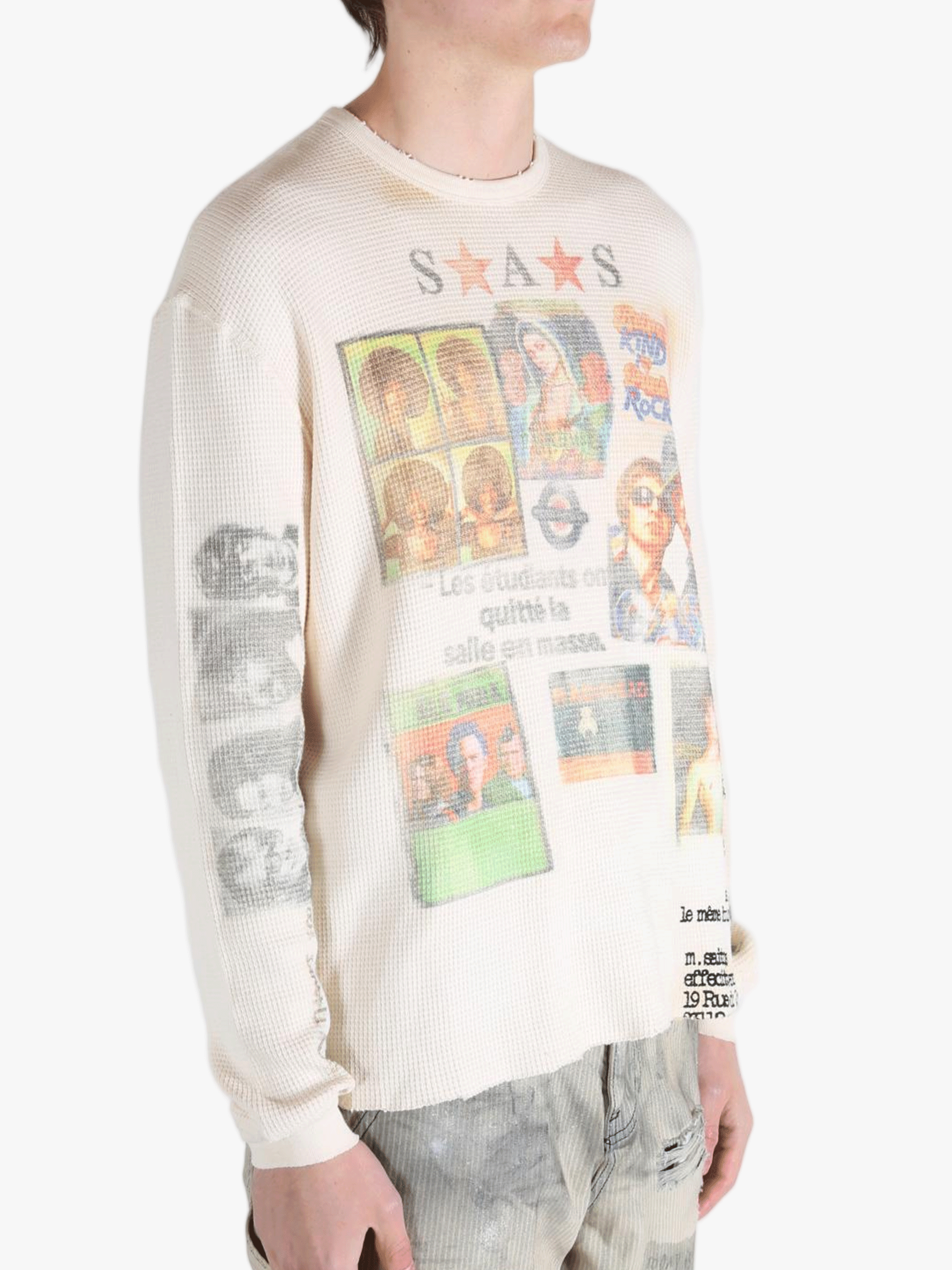 White knitwear worn by a person, showing the knitwear fit