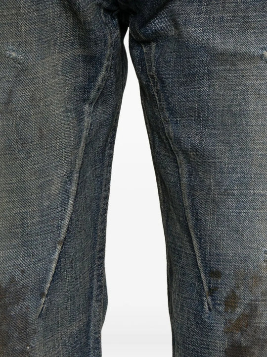Close up of the blue jeans, showing texture of the cotton fabric