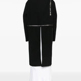 black jacket worn by a person, showing the jacket's fit
