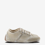 Tan sneakers, side view