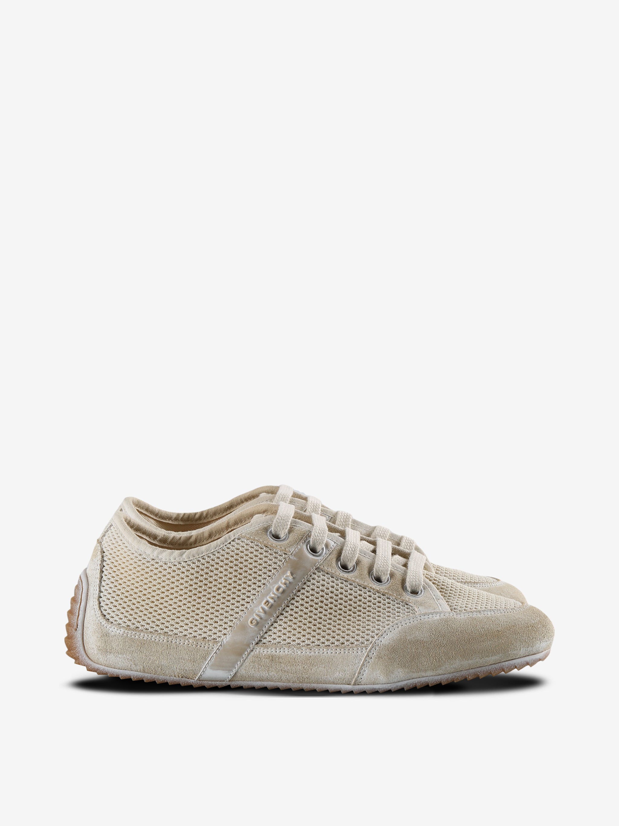 Tan sneakers, side view