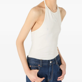 White tops worn by a person, showing the tops' fit