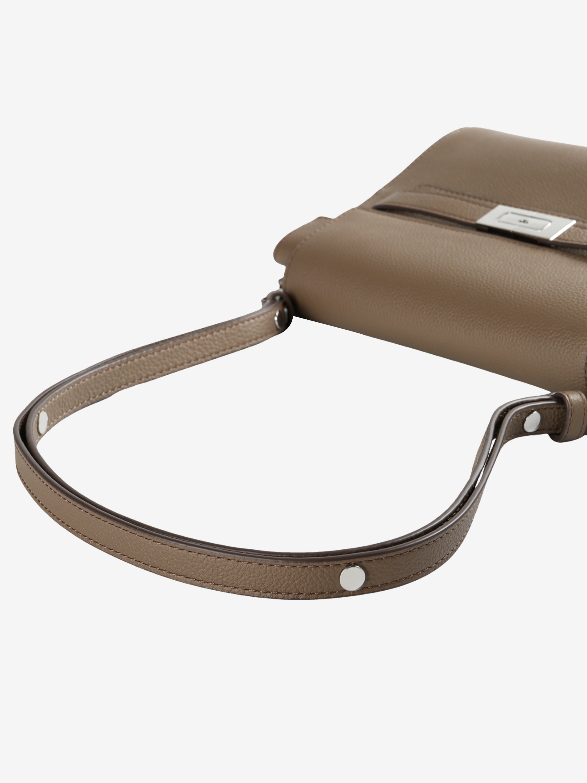 Close up of brown bag, showing texture of the leather fabric