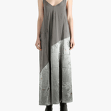 Grey dress worn by a person, showing the dress's fit