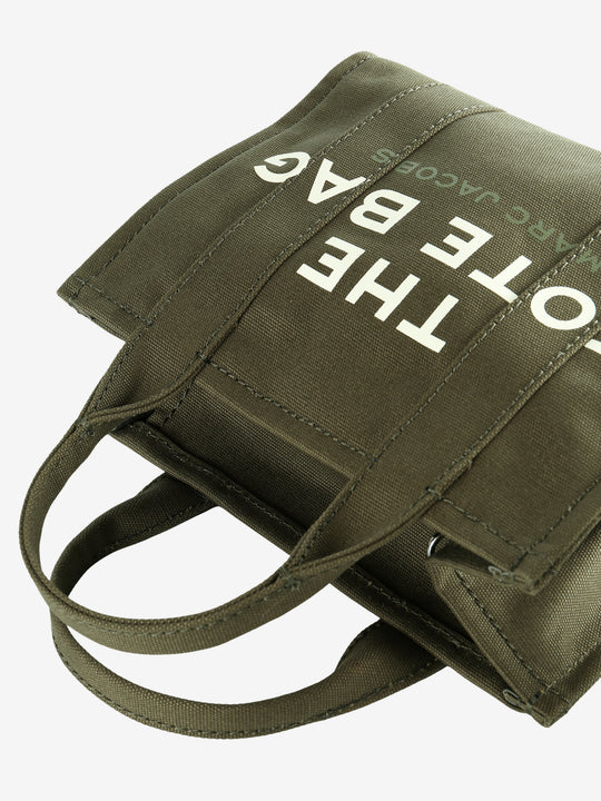 Close up of green bag,showing texture of the cotton fabric.