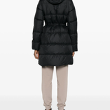 Black coat  worn by a person, showing the coat's fit