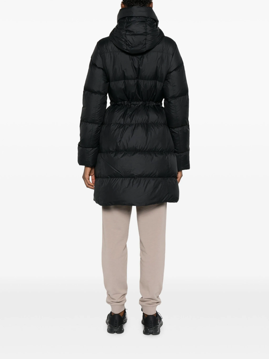 Black coat  worn by a person, showing the coat's fit