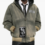 Green jacket worn by a person, showing the jacket fit