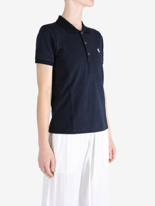 Navy shirt worn by a person, showing the shirt fit