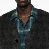 Close up of grey knitwear, showing texture of the Wool fabric