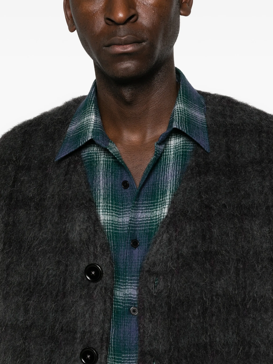 Close up of grey knitwear, showing texture of the Wool fabric