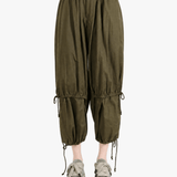 Green pants, full body view